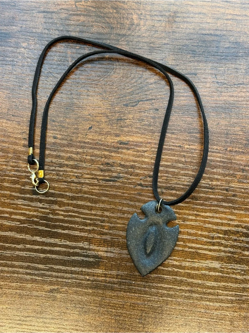 Handmade Dark Gray Granite Stone Arrowhead Pendant on Black Suede Cord